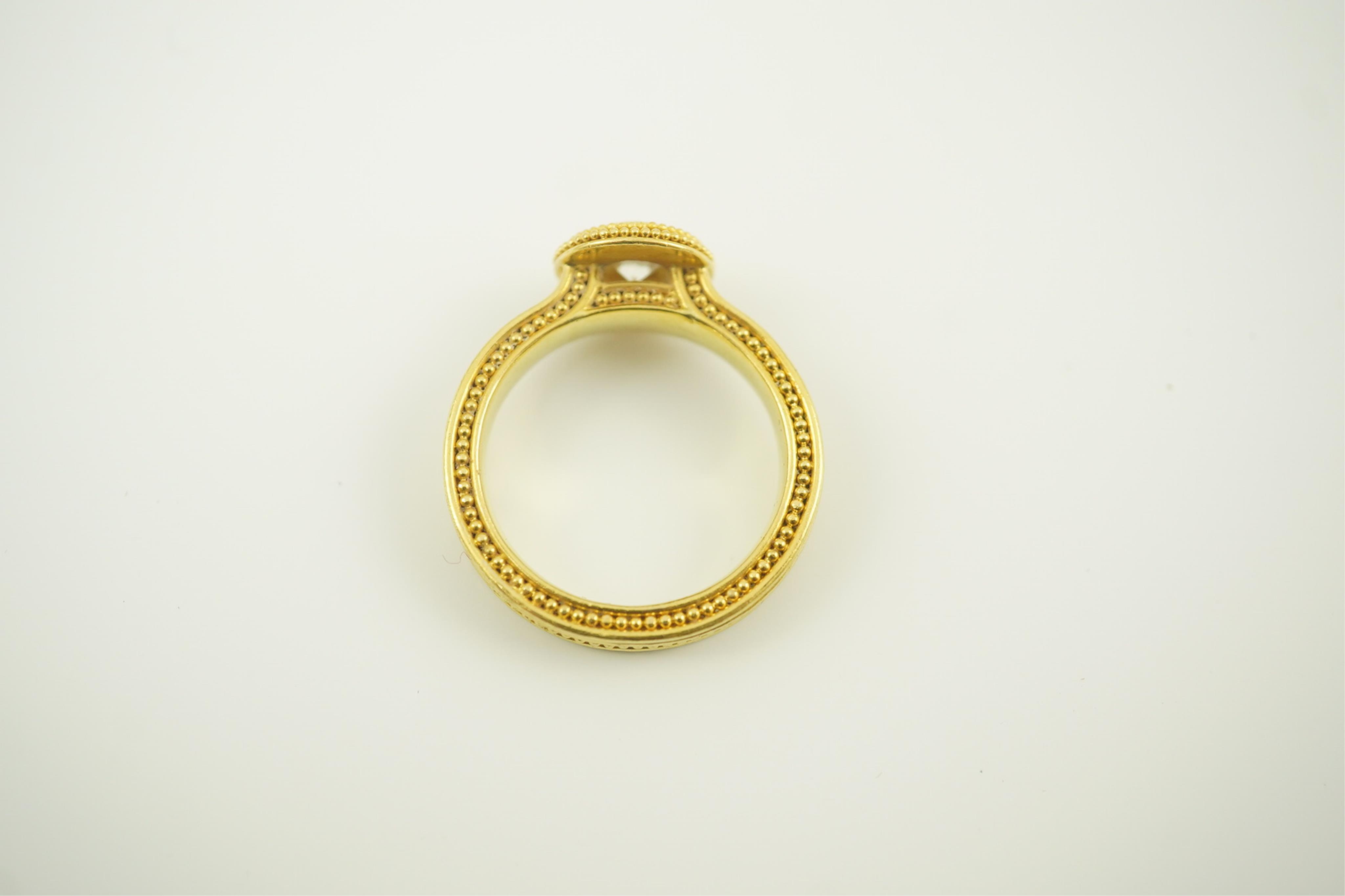 A 22ct gold collet set diamond dress ring